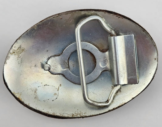 Back of the Hand Tooled Leather Vintage Belt Buckle — Oval Pinwheel Flower, showing the silver-tone metal belt buckle back and loop hardware.