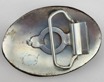 Back of the Hand Tooled Leather Vintage Belt Buckle — Oval Pinwheel Flower, showing the silver-tone metal belt buckle back and loop hardware.