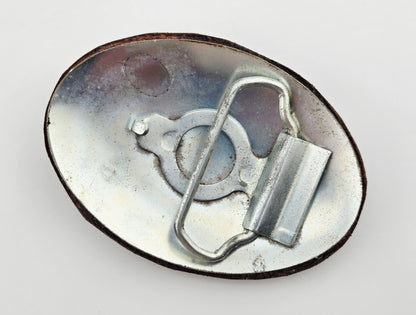 Back of the Hand Tooled Leather Vintage Belt Buckle — Oval Interlaced Vine, showing the silver-tone metal belt buckle back and loop hardware.
