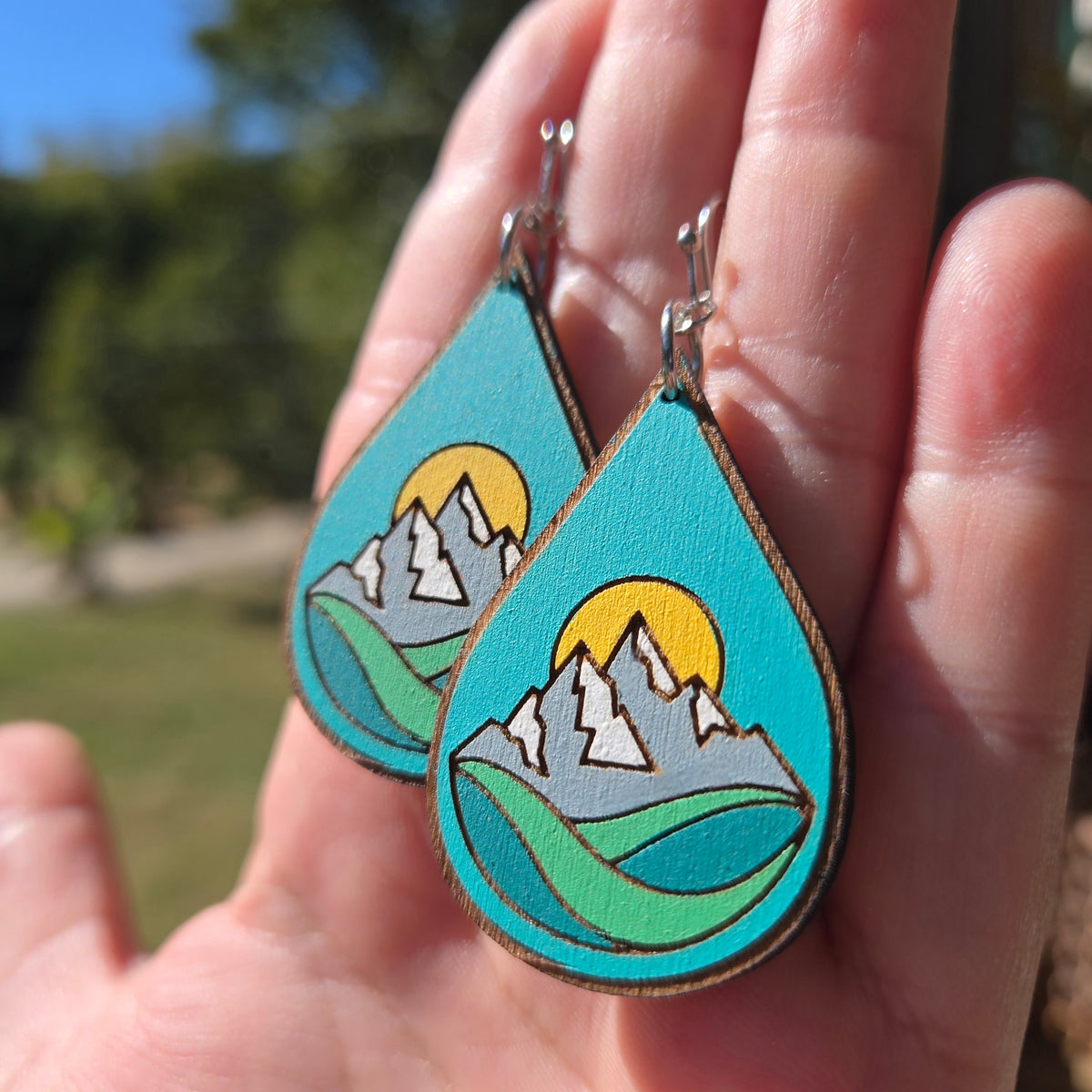 Mountain and sun earrings, alternate view