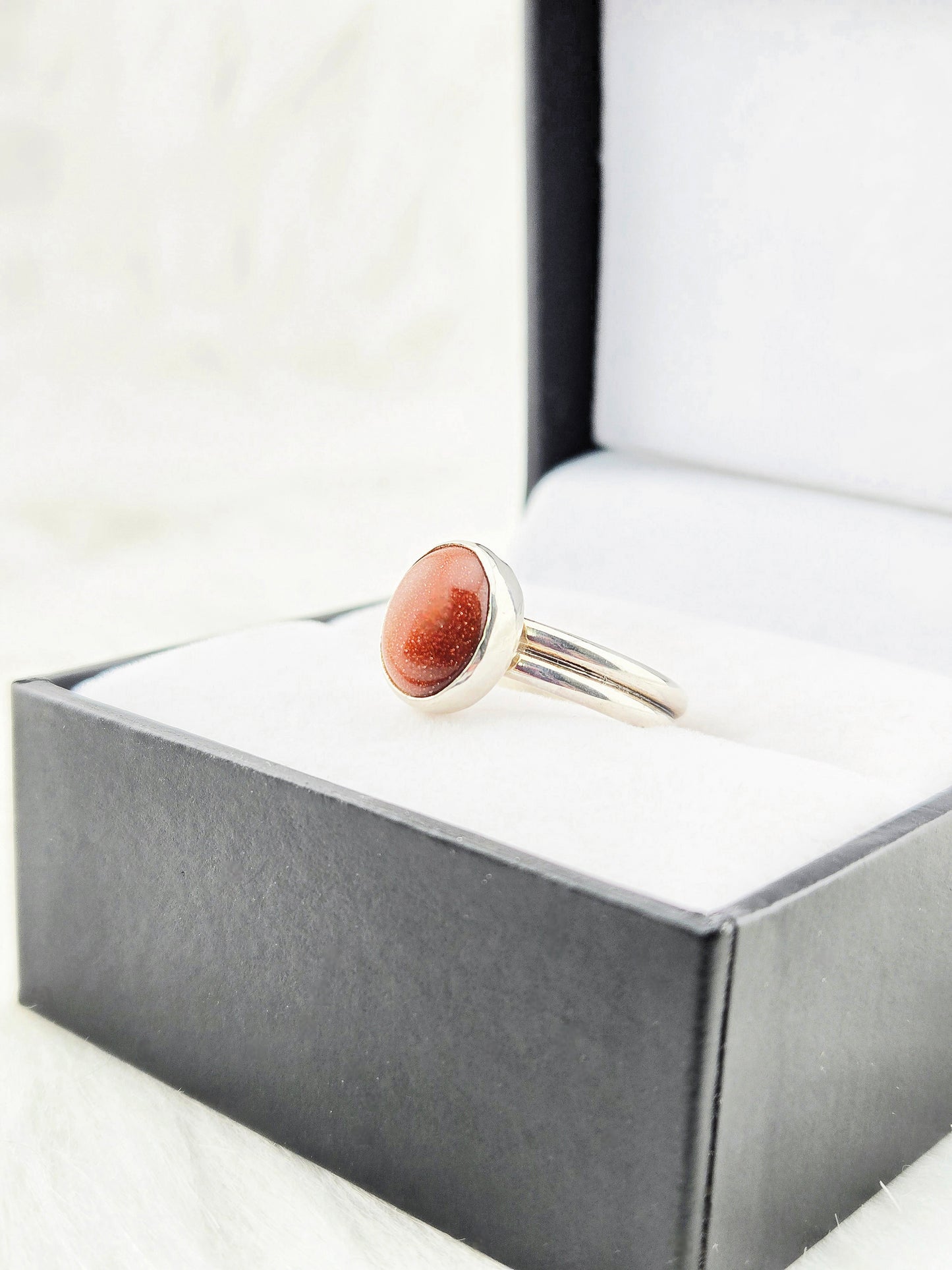 Hand Cut Goldstone set in Hand Fabricated .925 Silver Setting with Double Half Round Shank (Size 7.5)