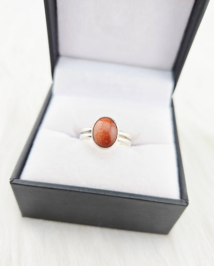 Hand Cut Goldstone set in Hand Fabricated .925 Silver Setting with Double Half Round Shank (Size 7.5)