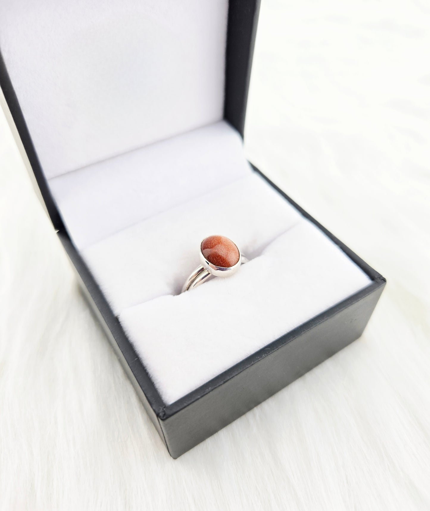Hand Cut Goldstone set in Hand Fabricated .925 Silver Setting with Double Half Round Shank (Size 7.5)